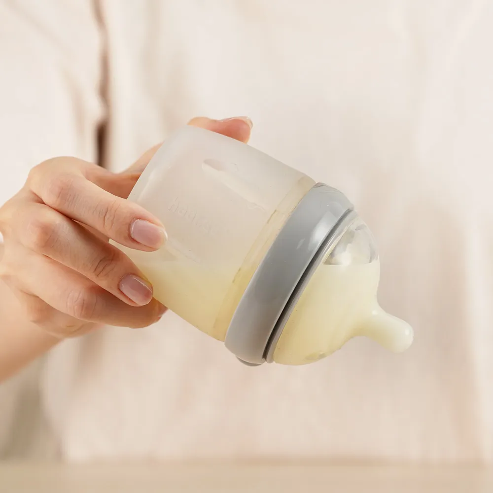 SET (Recolector de leche HAAKAA Desmontable 160ml + Tetina biberón) de Silicona - Imagen 3